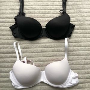 Set of 2 PINk by VS padded bras.  One black and one white.  Both size 32B.
